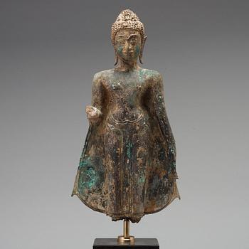 A standing figure of Buddha, Thailand, 18th Century.