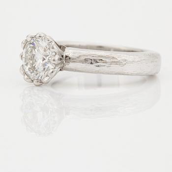 A SOLITAIRE RING.