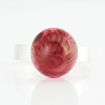 Sigurd Persson, a sterling silver bangle crowned with a strawberry coloured glass ball, Stockholm 1995.