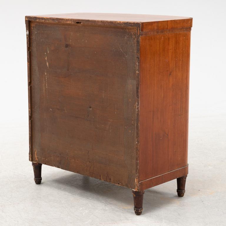 An empire style chest of drawers, 19th Century.