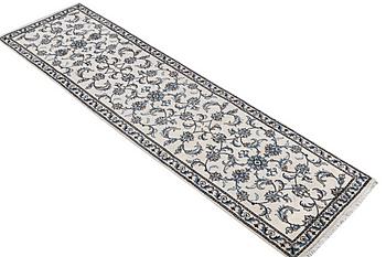 A runner carpet, Nain, part silk, c.297 x 80 cm.