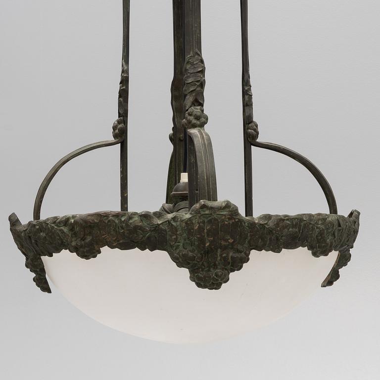 An Art Noveau celing lamp, early 20th century, attributed to Alice Nordin fo Böhlmarks.