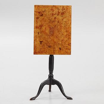 A Swedish burr-veneered tilt-top table, circa 1800.