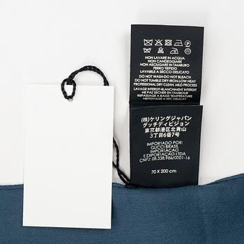 Gucci, a wool and silk mix "GG" jaquard shawl.