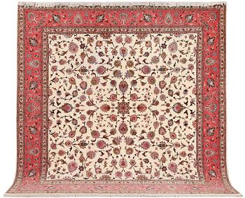 An old Tabriz carpet, part silk, 60 raj, c. 253 x 250 cm.