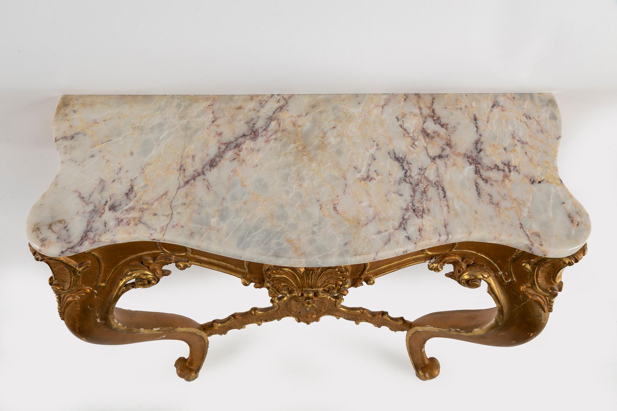 A mirror and console table, late 19th century.