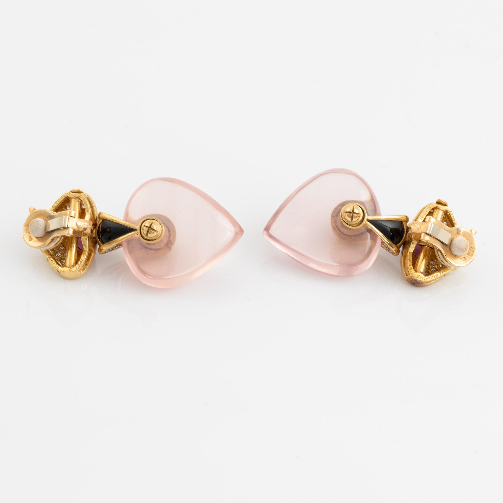 A pair of Marina B earrings.