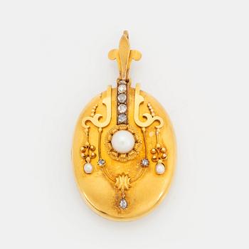 391. A 14K gold locket set with pearls and rose-cut diamonds.