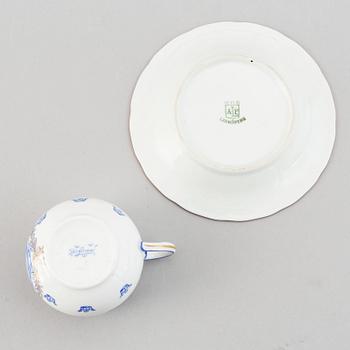 A set of 12 Rörstrand "Gripsholm" custard cups with dishes, Sweden, 20th Century.