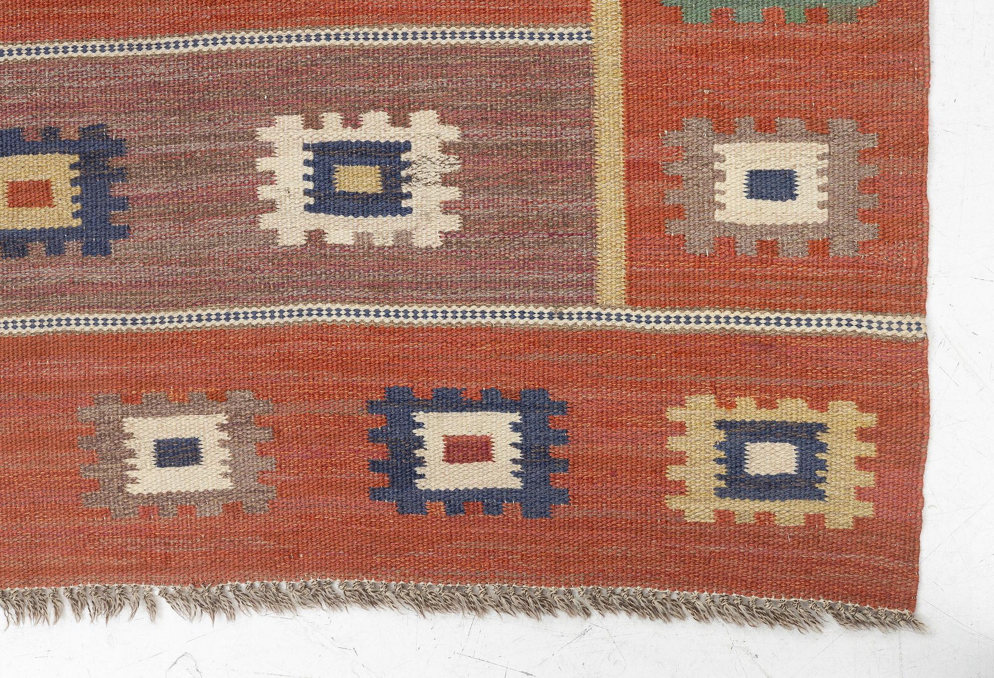 Märta Måås-Fjetterström, a carpet, 'Röd grön äng', flat weave, c. 242 x 177 cm, signed AB MMF.