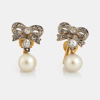 1058. A pair of CG Hallberg earrings set with pearls and diamonds.