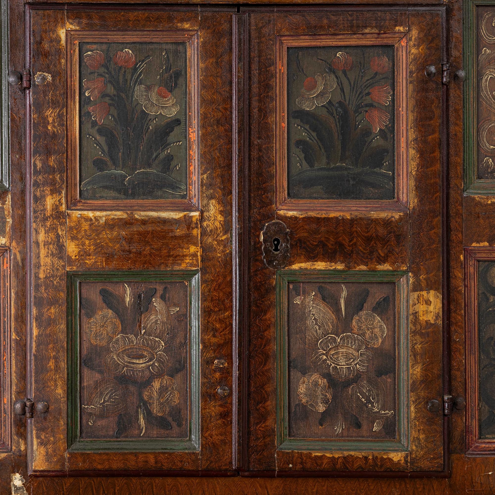 A corner cupboard, dated 1779.