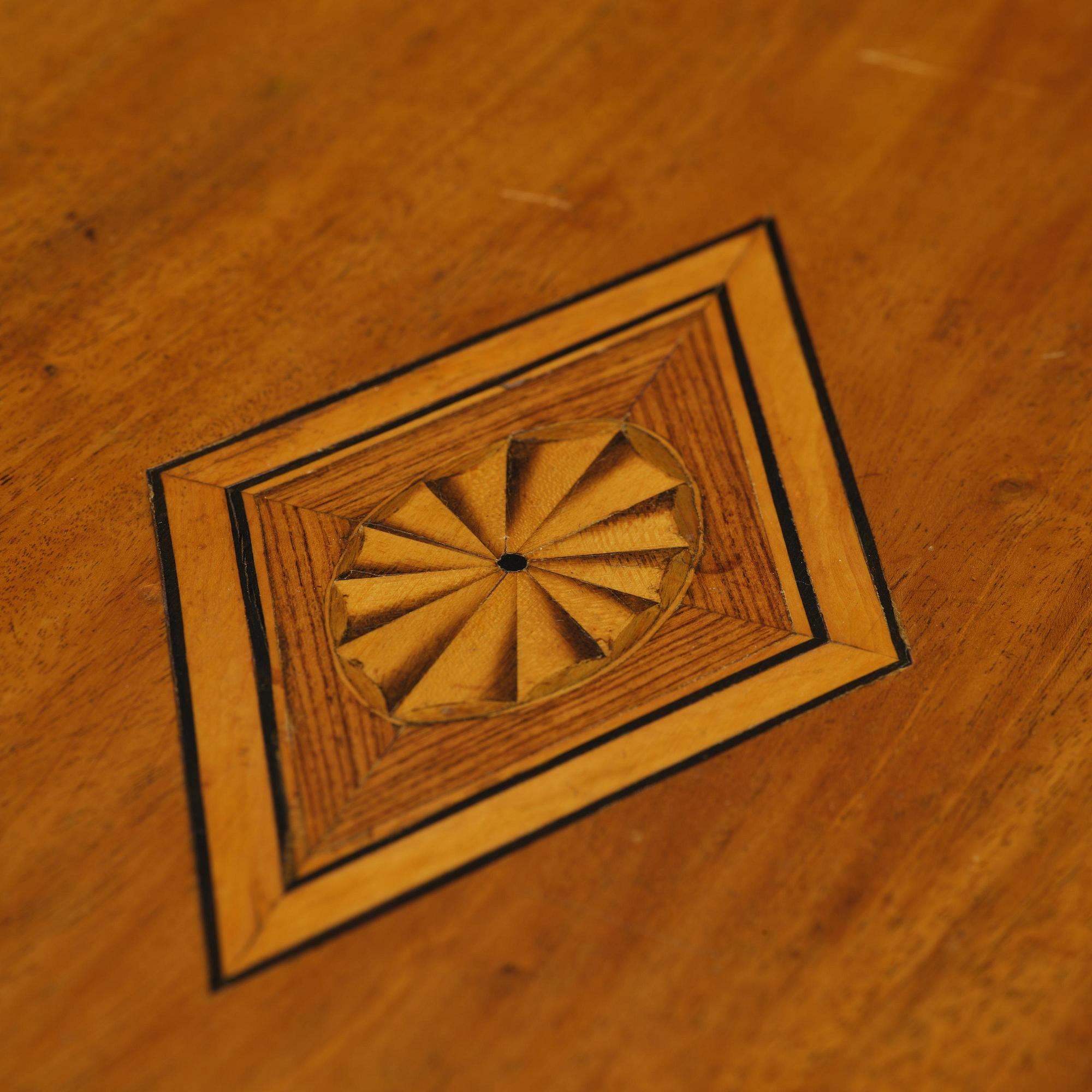 A late Gustavian mahogany table attributed to L. Qvarnberg (master in Stockholm 1801-13).