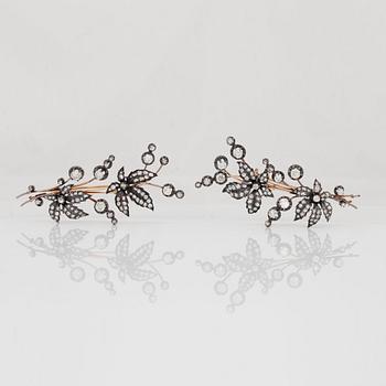 Two old-cut diamond floral brooches that can be worn as a tiara. Circa 1860 - 1880's.