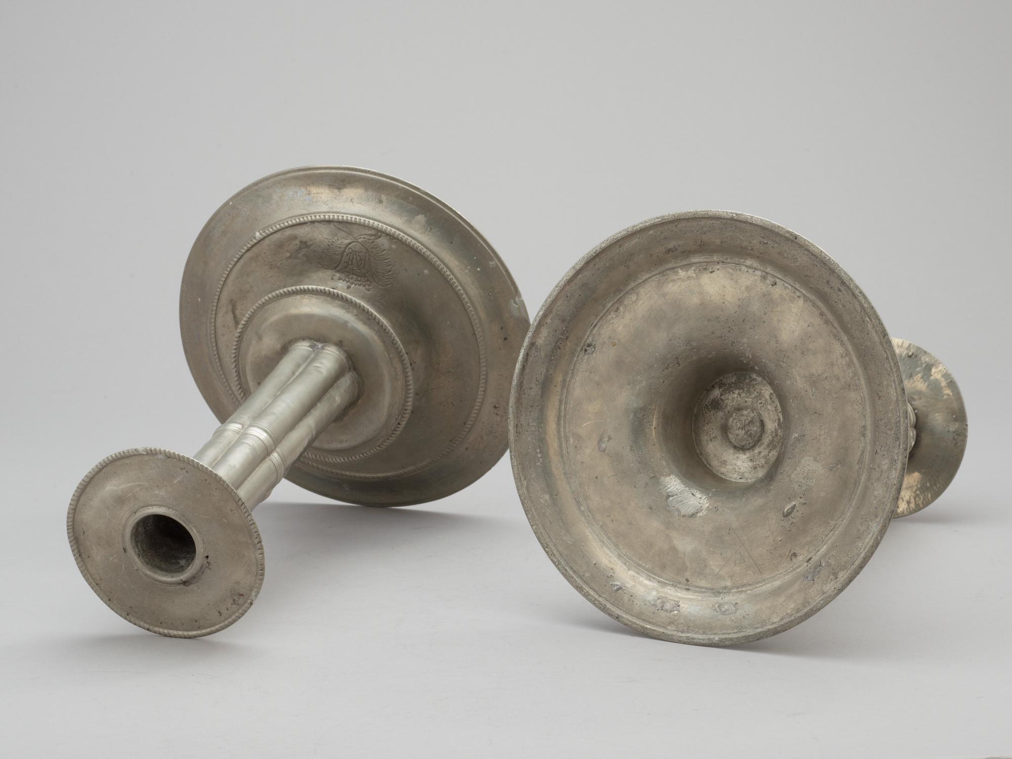 A pair of English Baroque pewter candlesticks by Francis Lea (-1675) London.