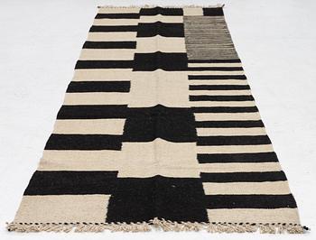 A Kelim runner carpet, 300 x 93 cm.
