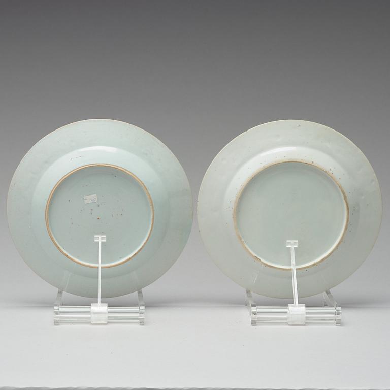 A pair of famille rose armorial dinner plates, Qing dynasty, Qianlong (1736-95).