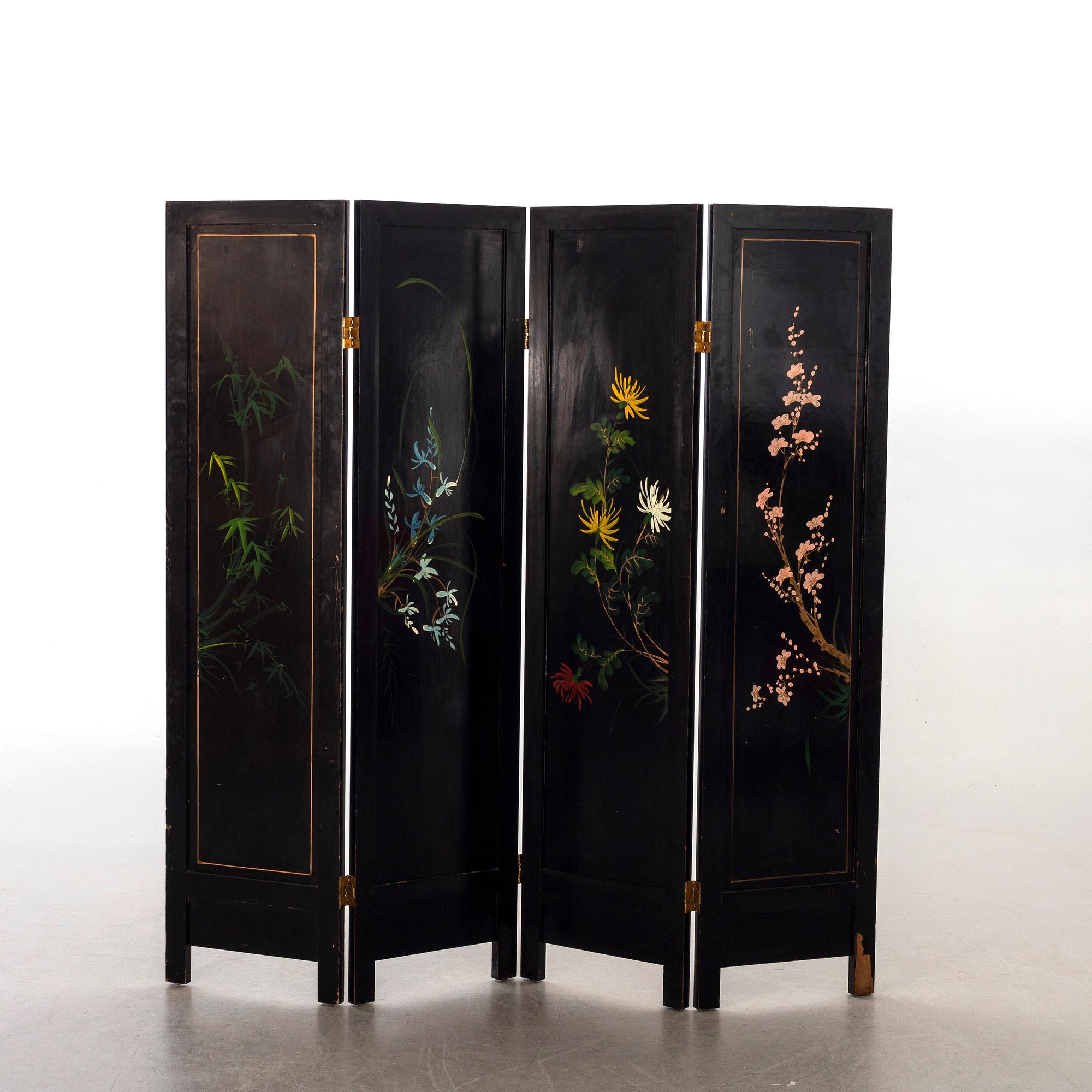 A Japanese 20th century lacquered folding screen with stonework,