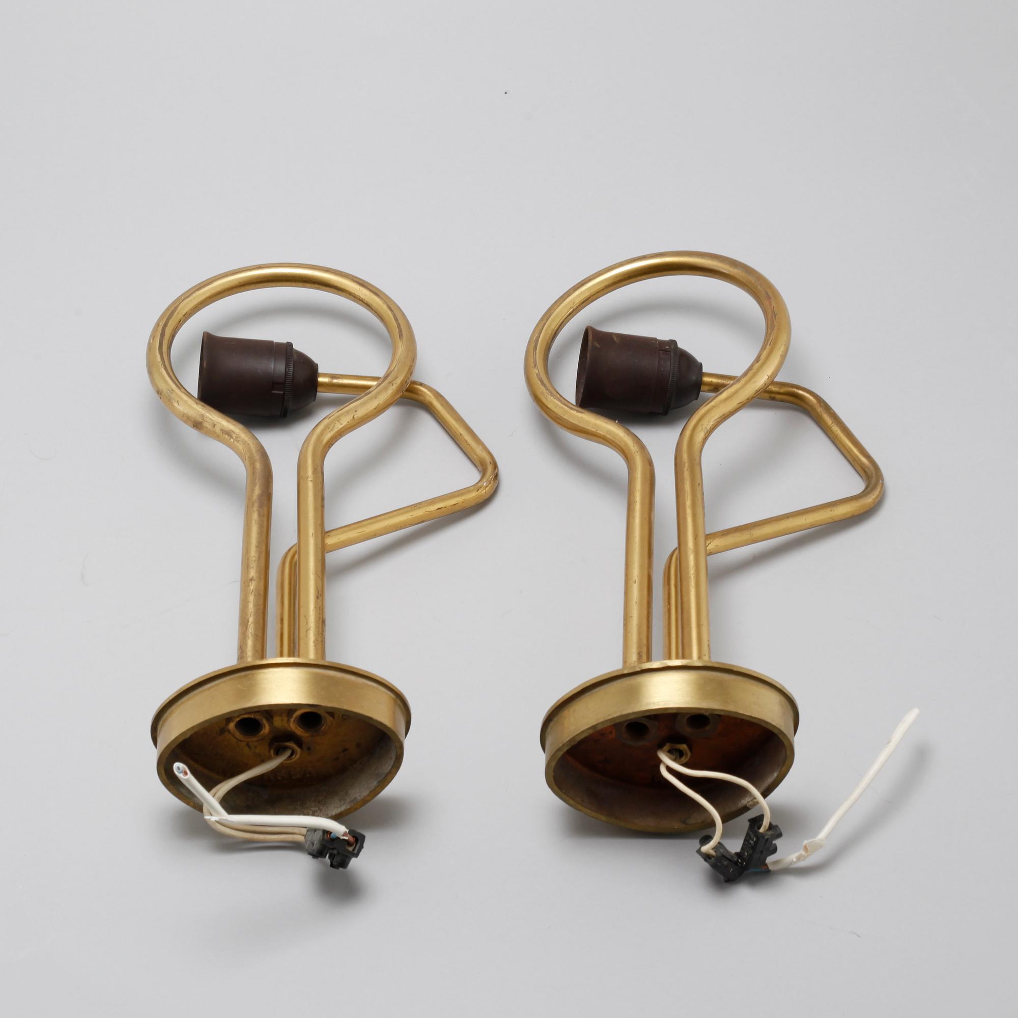 A pair of wall lamps from ASEA, around the mid 20th century.