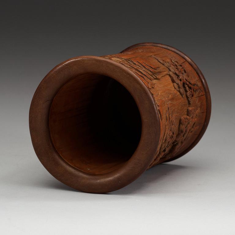 A carved bamboo brush pot, presumably late Qing dynasty (1644-1912).