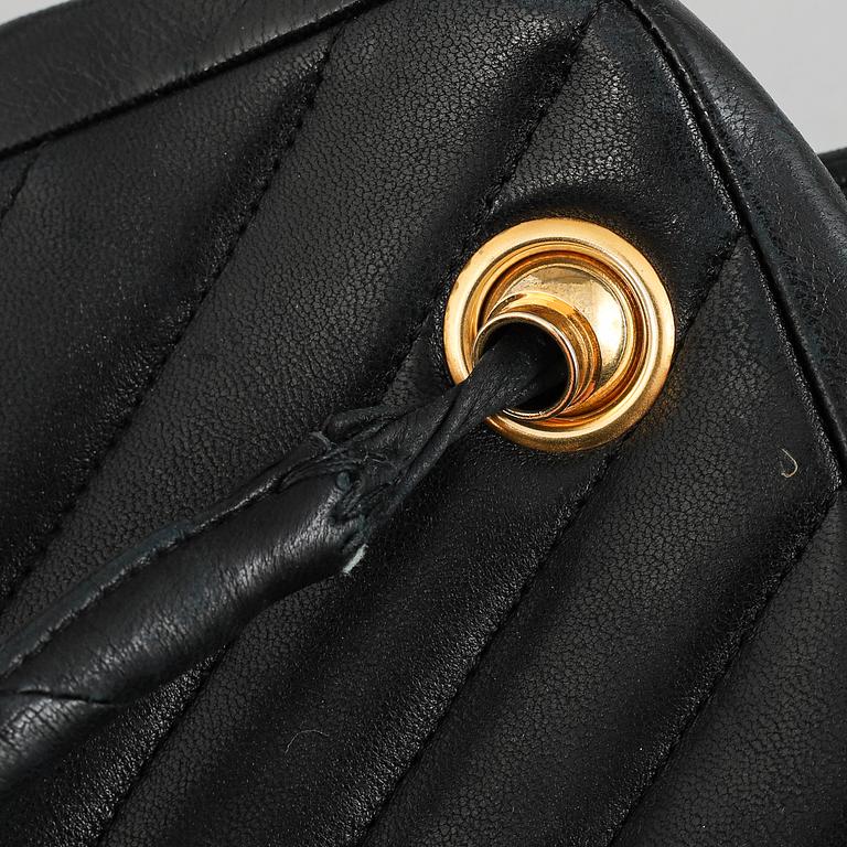 Chanel, a black leather handbag, 1980's.