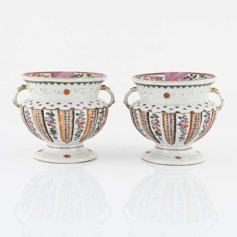 A pair of famille rose flower pots, Qing dynasty, Qianlong (1736-95).