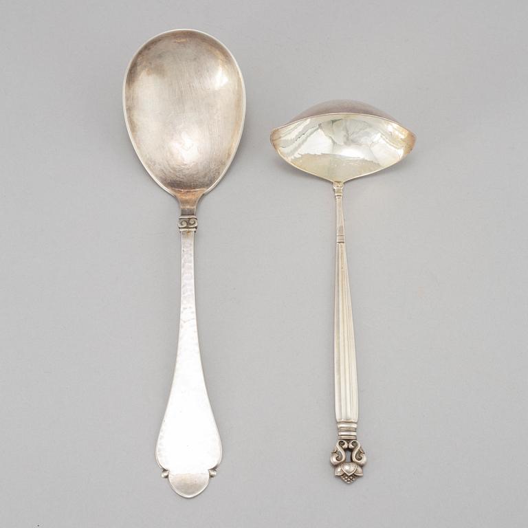 Johan Rohde, an 'Acorn' sterling sauce ladle, Georg Jensen post 1945 + a Danish silver serving spoon, Copenhagen 1931.