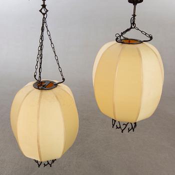 A pair of Chinese 20th century ceiling lamps.