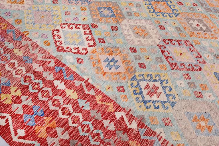 A Kilim carpet, approx. 344 x 268 cm.