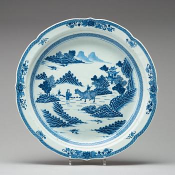 A large blue and white dish with strainer, Qing dynasty, Qianlong (1736-95).