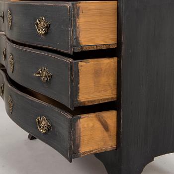 An 18th-Century chest of drawers.
