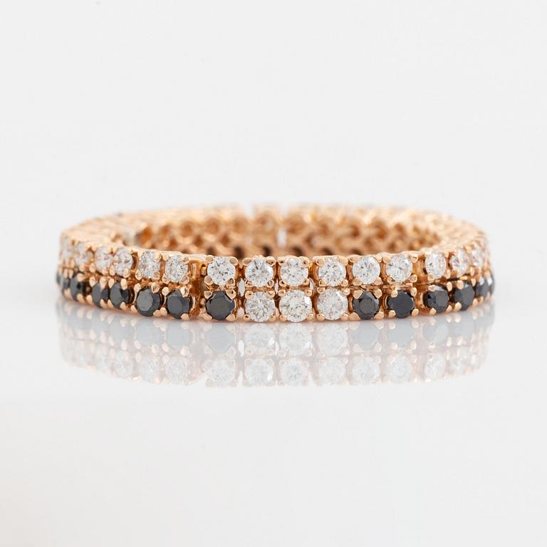 Black and colourless diamond ring.