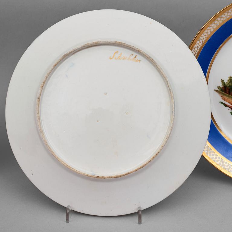 A set of 10 French ornitological dessert plates, signed Schoelber, 19th Century. (8+2).