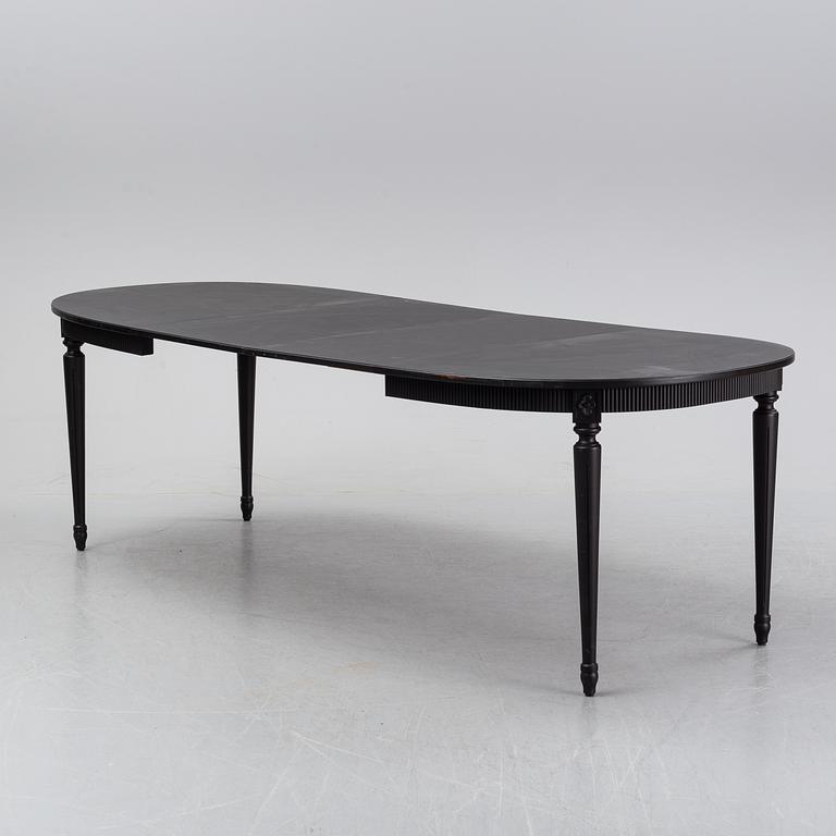 A painted Gustavian style dining table, second half of the 20th Century.