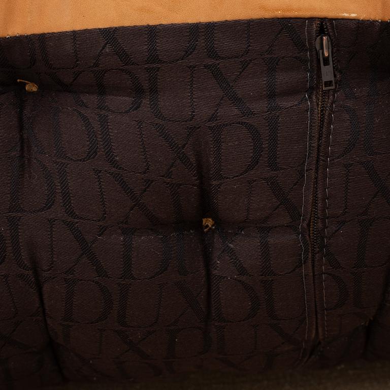 Bruno Mathsson, a pair of "Karin" armchairs, Dux, Sweden, late 20th century.