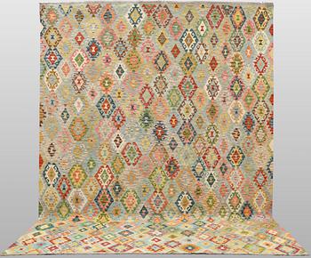 A Kilim carpet, approx. 395 x 324 cm.