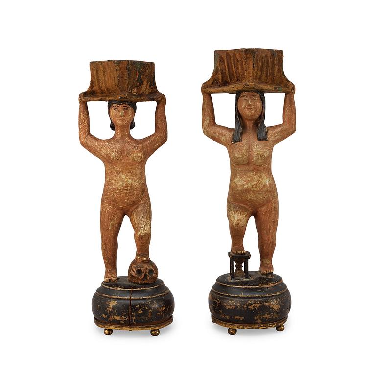 A pair of Swedish 19th century wooden candlesticks.