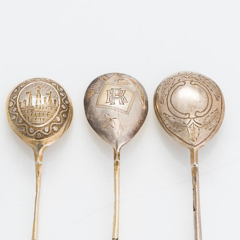 Twelve parcel-gilt teaspoons and a jam spoon, Russia 1887-1926.