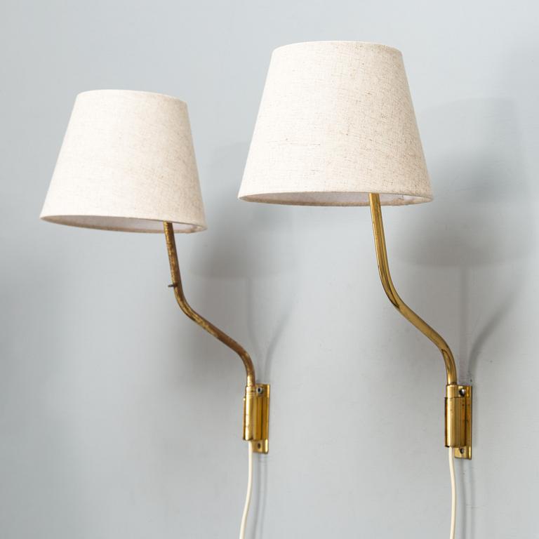 Lisa Johansson-Pape, Two mid-20th century '3053' wall lights for Stockmann Orno.