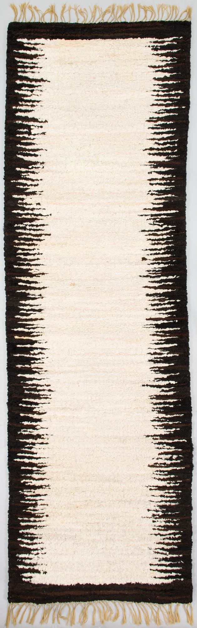 A sheepskin carper for Furcarpet. Circa 300x95 cm.