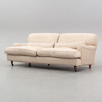 A 'Raffles' sofa designed by Vico Magistretti in 1988 for DePadova.