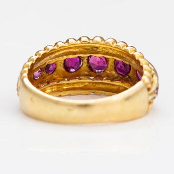 An 18K gold ring with rubies. Italy, finnish import marks.