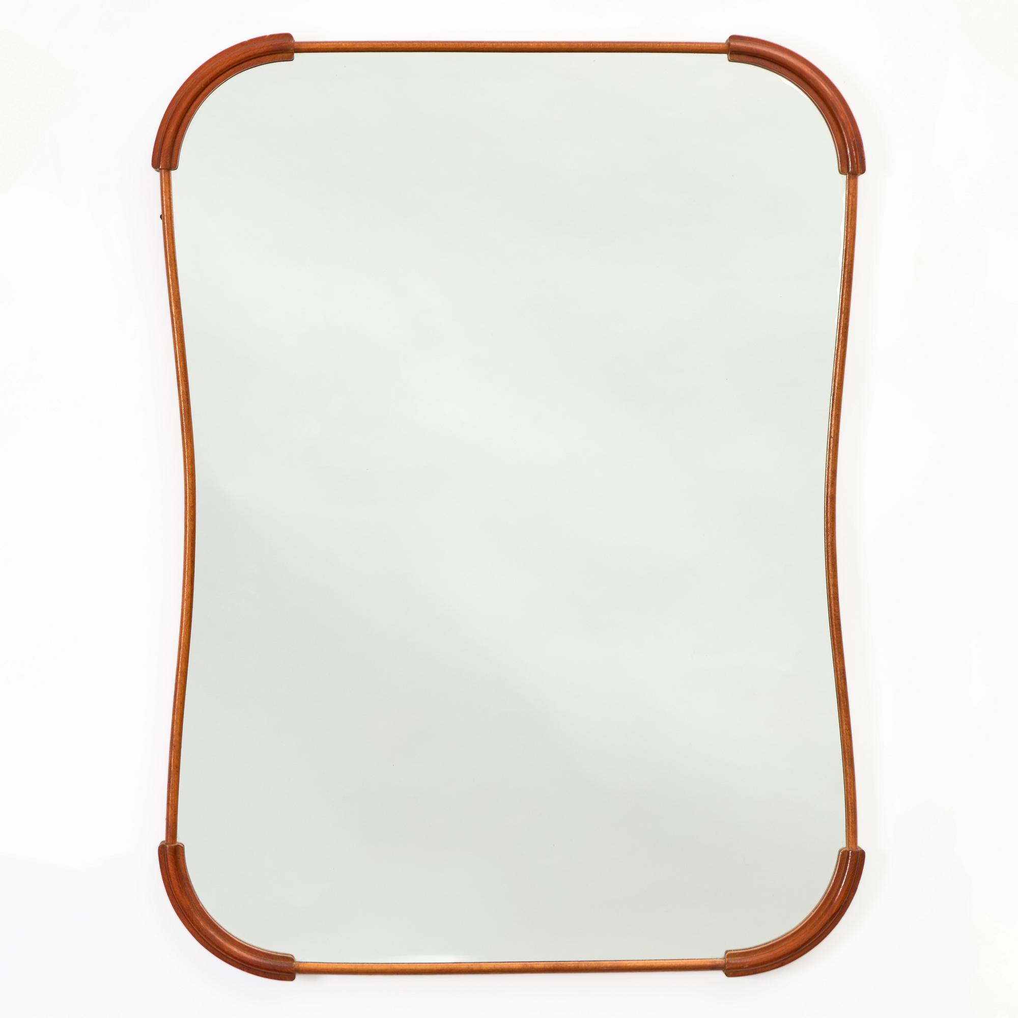 A 1940s Swedish Modern mirror.