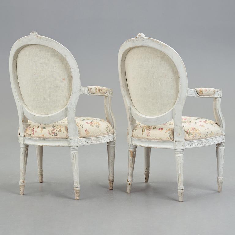 A pair of Gustavian late 18th century armchairs.