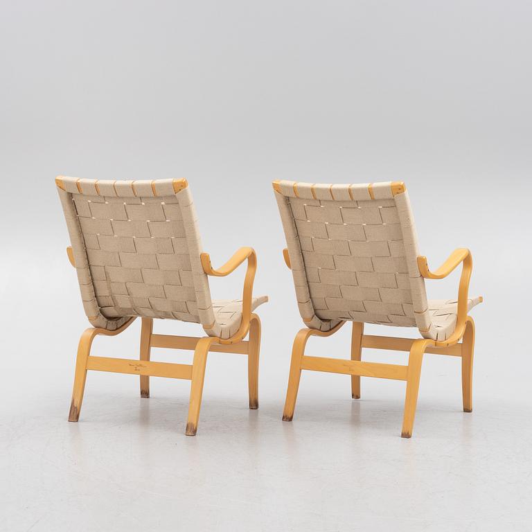 Bruno Mathsson, a pir of 'Eva' armchairs, Dux, late 20th century.