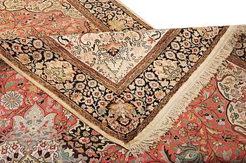 A silk Kashmar carpet, c. 280 x 177 cm.