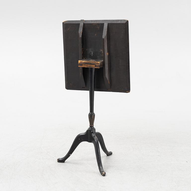 A Swedish tilt top table, from Nils Asplind's workshop signed and dated 1814.