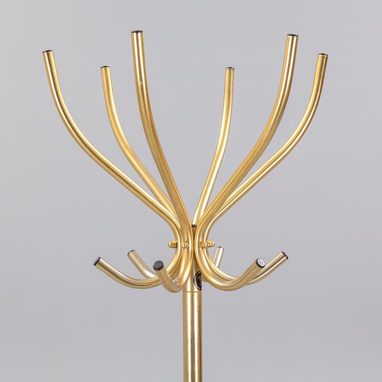 TAMBURMAJOR, guldpläterad metal, Rörmekano. Skånes Fagerhult, Sverige. 1970 / 80-tal.