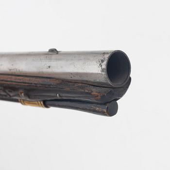 A flintlock pistol, 18th Century.