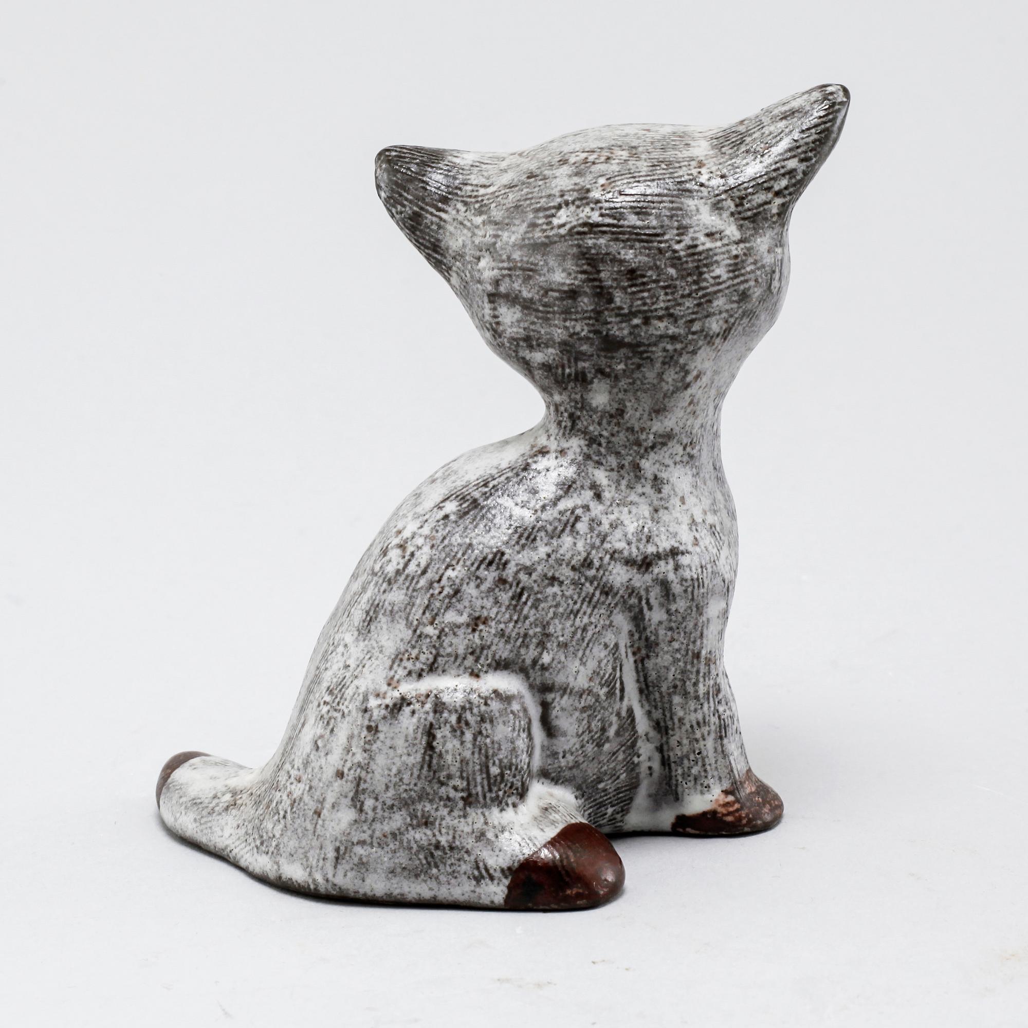 Eight stoneware figurines by Uppsala-Ekeby, from the latter half of the 20th century.